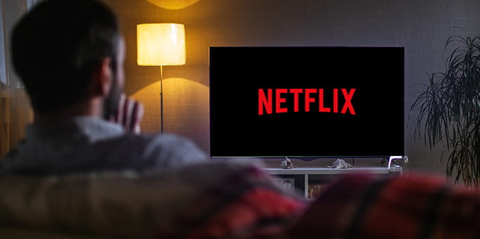 Netflix logo on distant TV screen